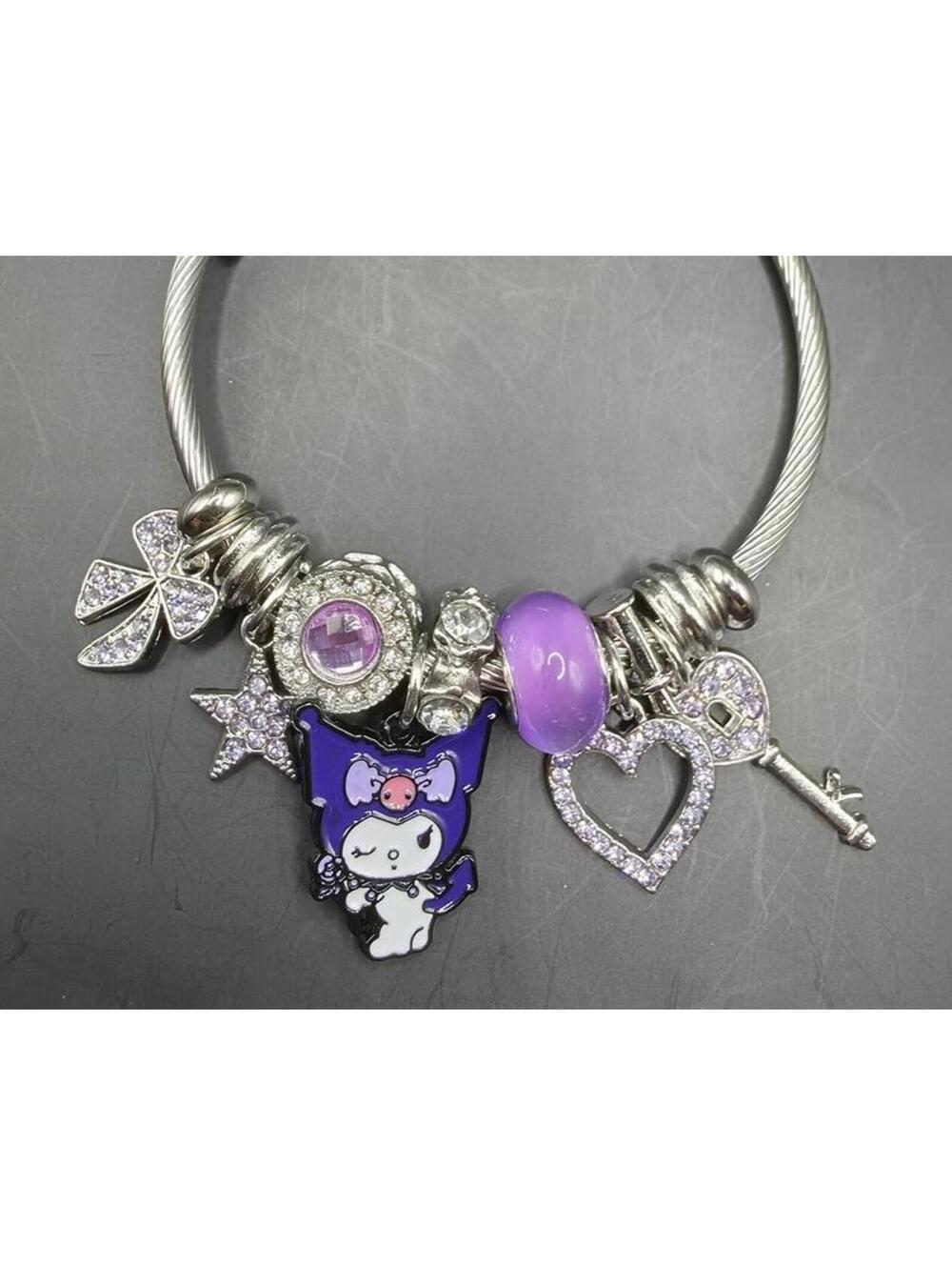 Silver Tone Charm Bracelet with Purple Accents and Assorted Charms